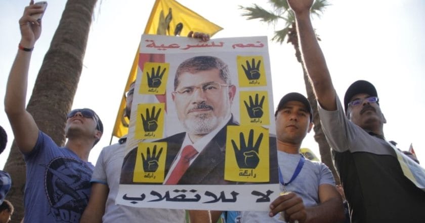 Protesters_with_poster_of_ousted_President_Morsi_in_Maadi-Cairo_20-Sep-2013